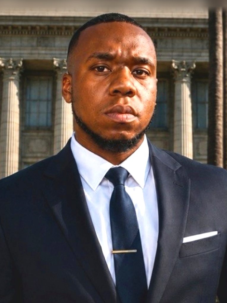 Anthony Jones, Esq., a California attorney, in a dark suit and tie.